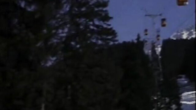 Burning Snow 1983 classic: Marilyn in snowy Alps with ski lift backdrop