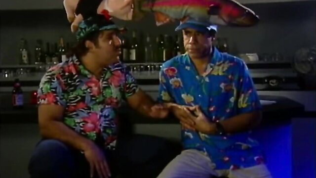 Two men in Hawaiian shirts chatting at bar, In The Year 2233