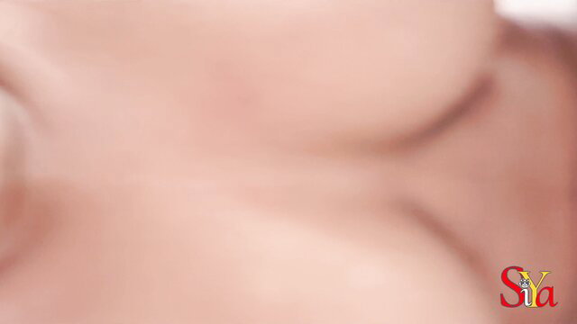 Blurry closeup of Indian wife's nude neck and breasts in debt sex video