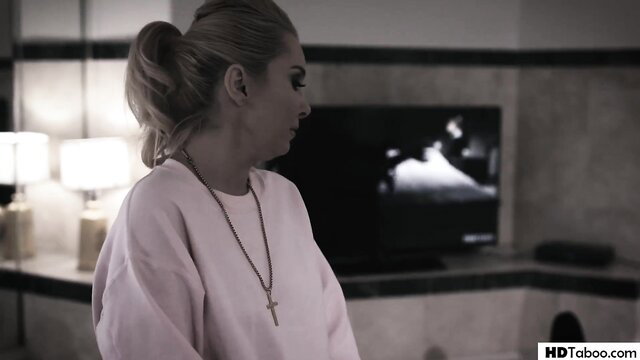 Aaliyah Love as blonde church stepmum in pink sweater glares sternly