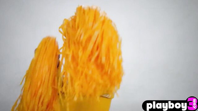 Lennon Elizabeth hot cheerleader with big orange pom poms