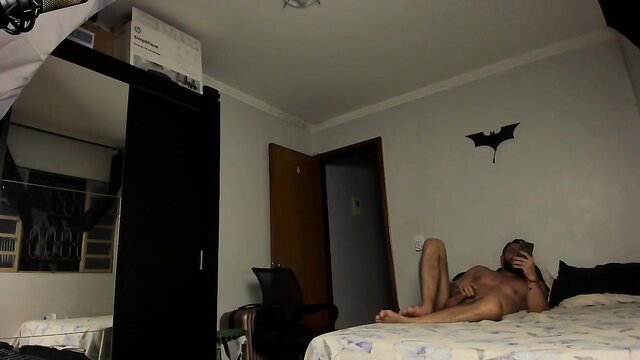 Hot Latino guy naked solo masturbation on bed with pulsing climax