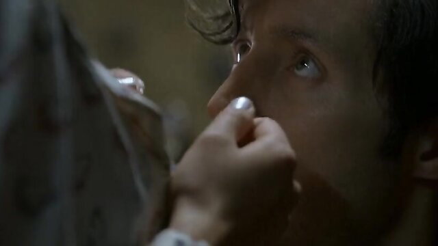Tuva Novotny closeup eye contact with Monet Mazur hand in erotic scene