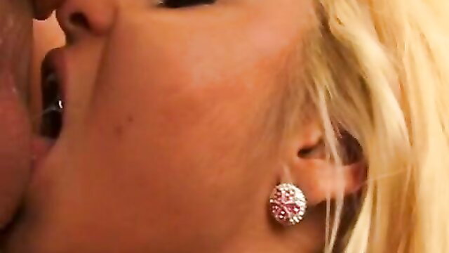 Andrea Sultisz blonde beauty deepthroating cock closeup