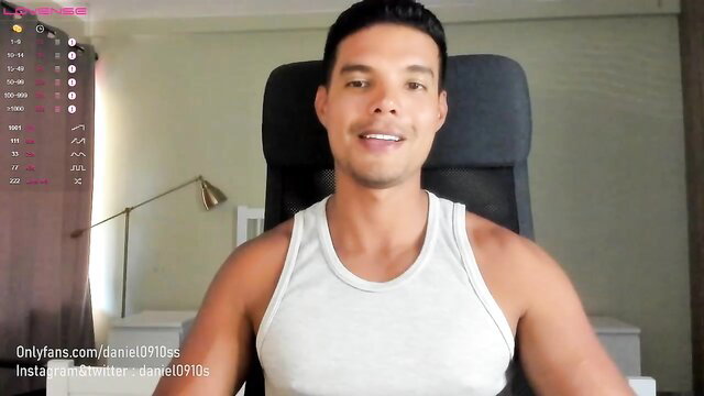 Muscular Asian man Daniel0910s smiling in tank top on cam
