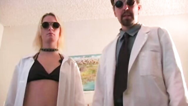 Blonde hypno girl in open shirt and bra with suited doctor