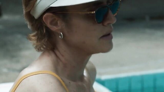 Silvia De Dios blonde milf in yellow top and shades poolside hot celeb scene
