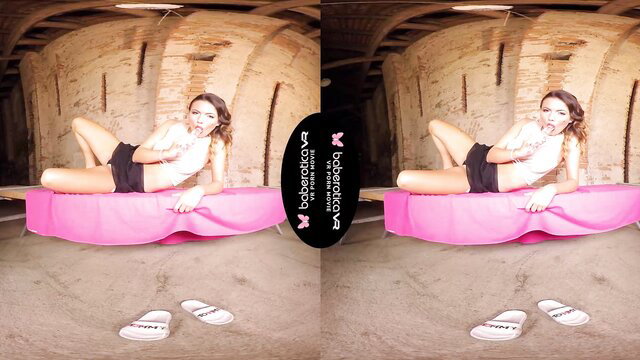 Vanessa Decker sultry barn pose on pink puff, hot VR tease