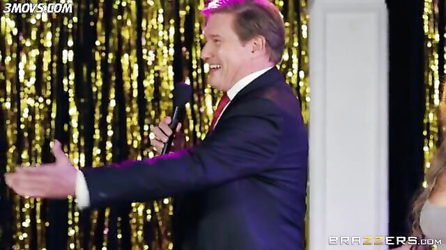 Danny D in suit hosts game show with Alessandra Jane on Brazzers
