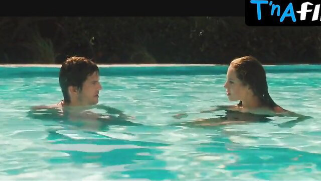 Margarita Levieva topless in pool with man in Spread breasts scene
