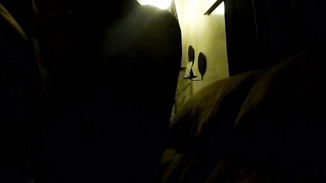 Blurry POV of woman riding cock while shaving bald head in dim light