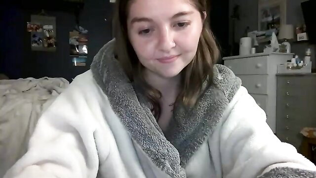 brunettebaby040 in fluffy robe, teasing camgirl closeup