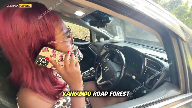 Redhead bosslady in car on Kangundo Road Forest, phone call tease