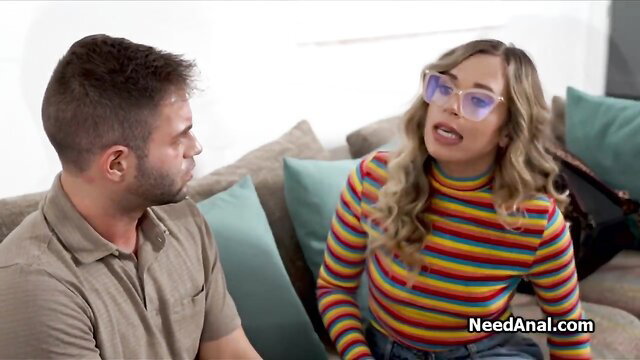 Blonde in striped turtleneck deepthroats guy on couch before anal reward