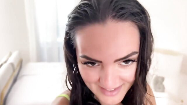 Wet brunette with sultry smile in slutty vacation tease