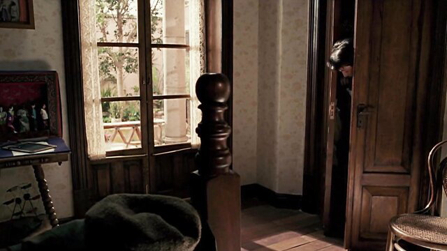 Salma Hayek in Frida 2002 peeking from door sexy scene