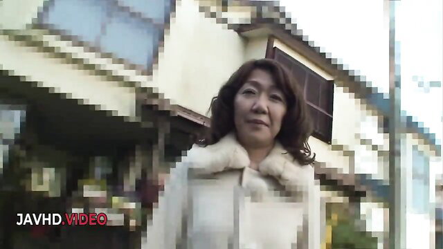 Eriko Nishimura in white fur coat outdoors JAV thumbnail