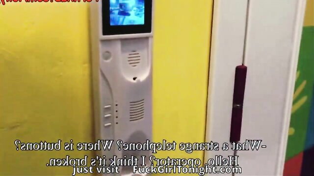 Hot Asian house owner teases repairman on intercom in yellow room