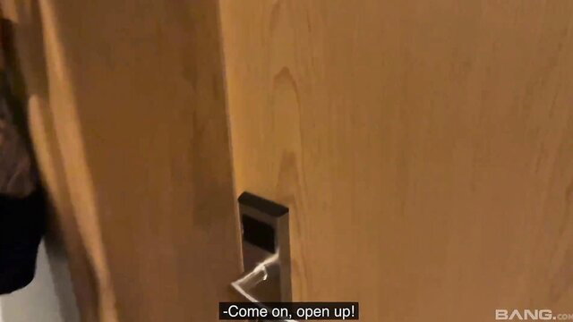 Blonde Lila Evance urges door open in sexy black dress