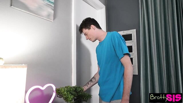 Nikki Nicole with shy stepbro holding plant in Bratty Sis scene