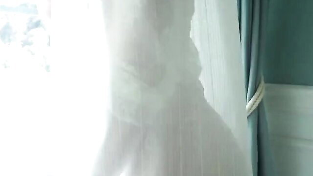 Melody Hina in TSDS-46026 JAV, silhouette in white dress by window