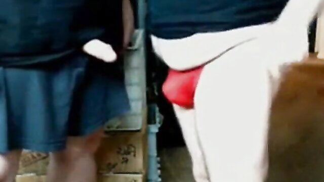 Amateur teen girl in school uniform sucking bulge in red briefs closeup