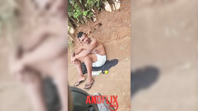 Drunk Indian man sitting shirtless in white shorts outdoor blowjob tease
