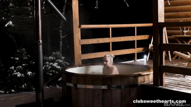 Hot blonde Lisa Nixon nude in steamy outdoor hot tub solo