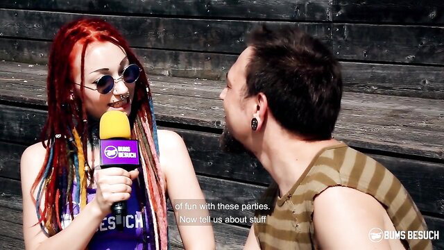 Redhead dreadlock babe Jezzicat interviews guy at Bumsuch party