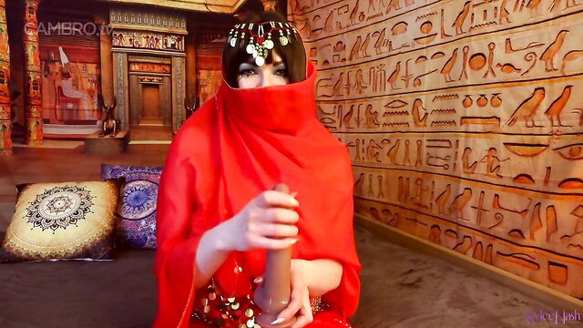 Arab seductress in red hijab veil strokes big cock in fetish fantasy