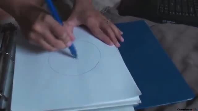 Renna Ryann drawing circle on paper in hot thumbnail