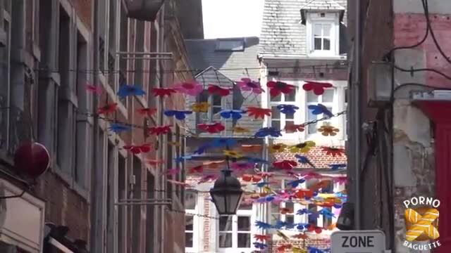 Colorful butterfly garlands over narrow European street Porn Zone