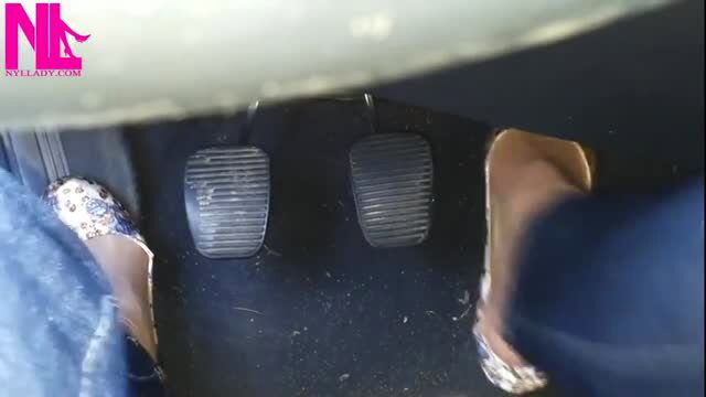 Foot fetish pedal pumping in floral flats from driver's seat POV