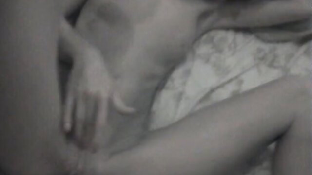 Blonde chick post-fuck blowjob closeup on bed