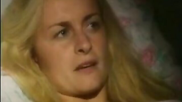 Blonde woman with intense gaze in bed, free engulfing licking porn