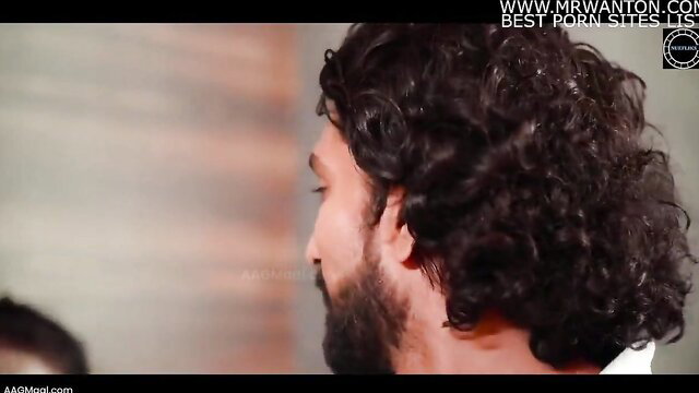 Curly-haired bearded Indian man in profile view from aunty sex video