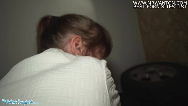 Shy brunette in white top bent over in Public Agent basement scene
