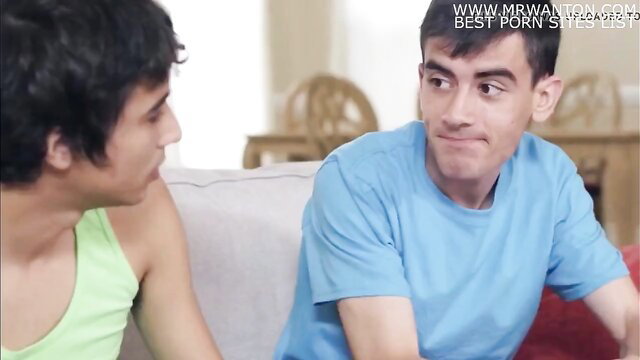 Two young Latino guys chatting on couch in sexy MMF prelude