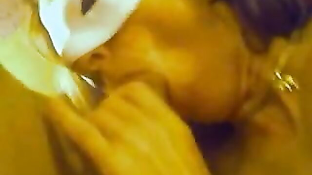 Mature French Kenna in mask sucking cock closeup
