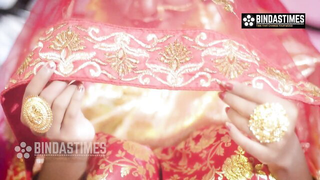 Indian Bhabhi Bebo veiled in red saree with gold jewelry, closeup hands