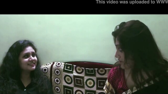 Two hot Indian MILFs chatting intimately, saree tease