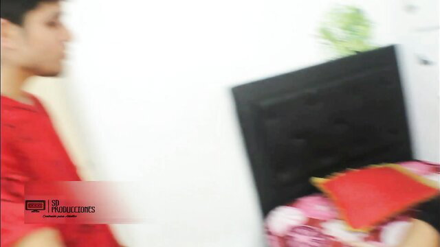 Blurry Desi man in red shirt by bed in Indian orgy thumbnail