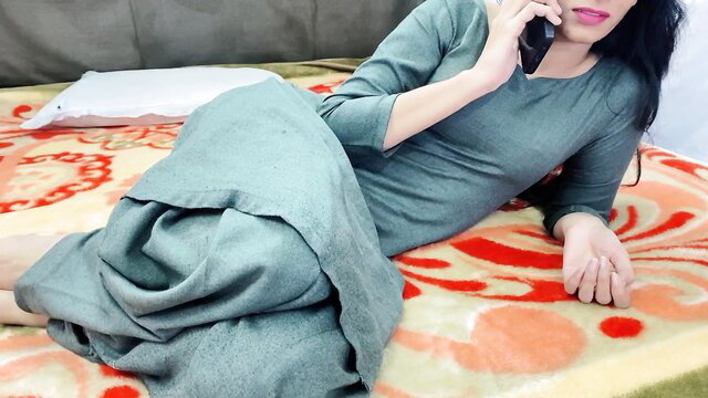 Hot Punjabi Jatti in tight salwar kameez lying seductively on bed