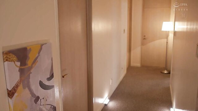 Japanese hotwife slut in dimly lit hotel hallway, teasing pose