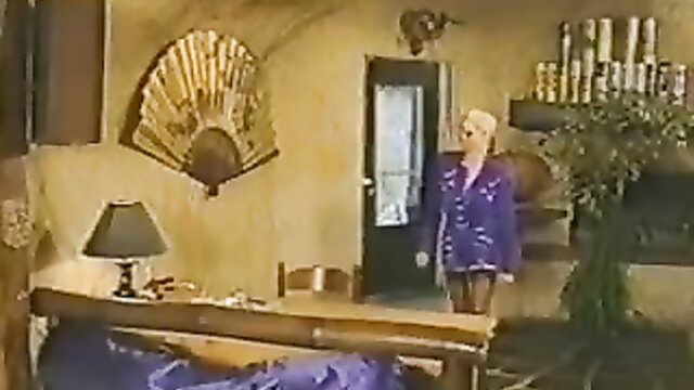 Vintage blonde German MILF in purple outfit stands ready for extreme anal threesome