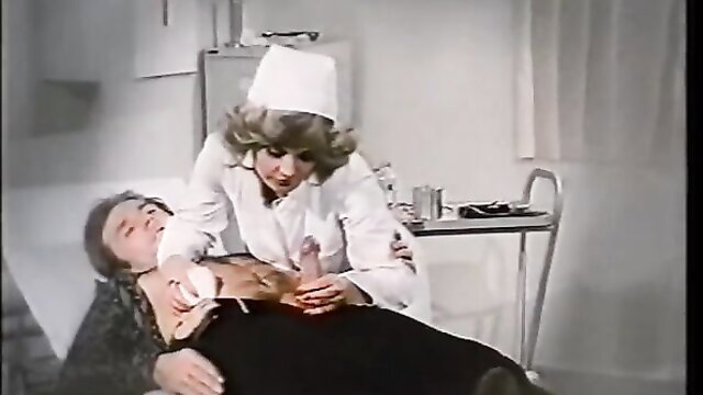 Retro nurse in white uniform penetrates patient with dildo, 1976 porn