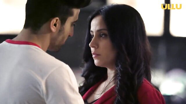 Indian mom in red dress gazes at son in intimate close-up from Maa Aur Beta