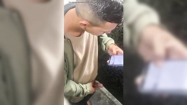 Asian man caught on phone exposing hard cock outdoors amateur flagra