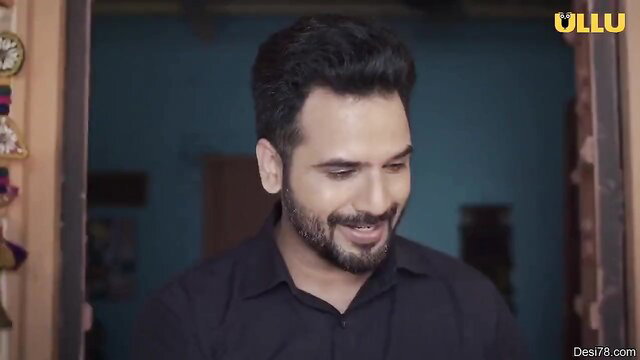 Handsome Indian man smiling in black shirt, Ullu adult series thumbnail