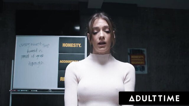 Kenna James in tight white sweater, honest expression, Adult Time